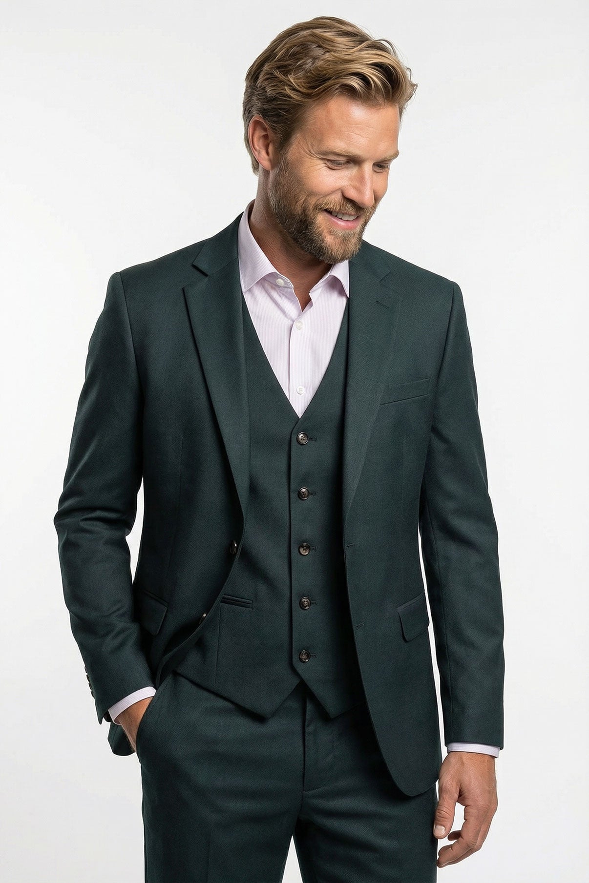 Mørkegrøn klassisk blazer med matchende vest og hvide skjorteknapper, set forfra.