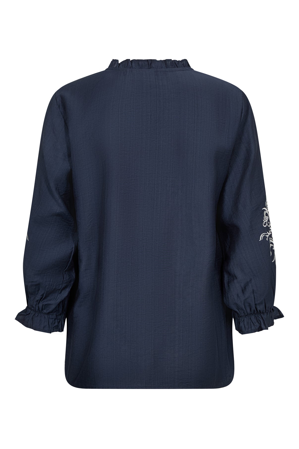 Sailorblå bluse med broderi, lange ærmer og elastiske manchetter med flæsekant.