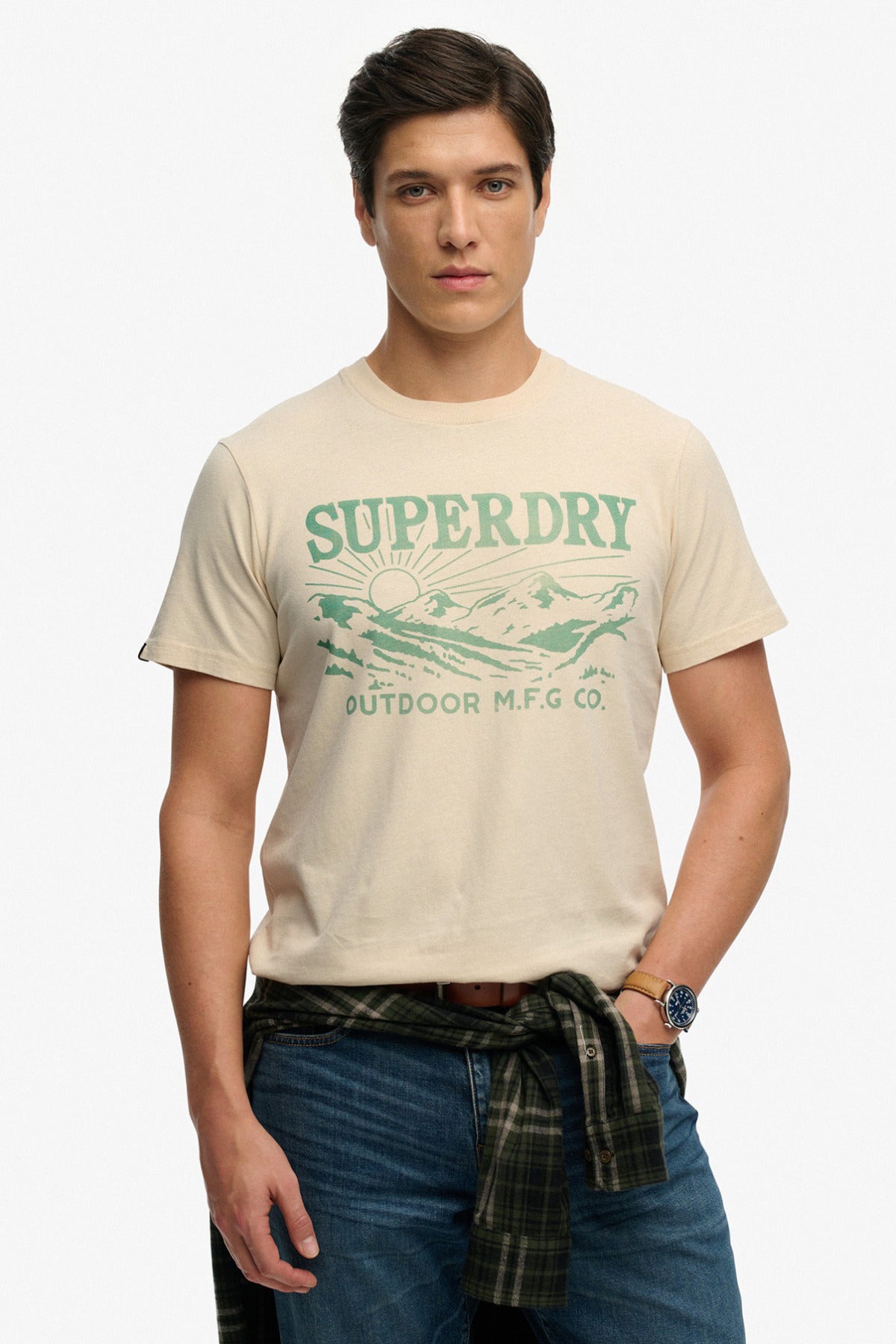 Beige t-shirt med grønt retro print og rund hals med afslappet pasform.