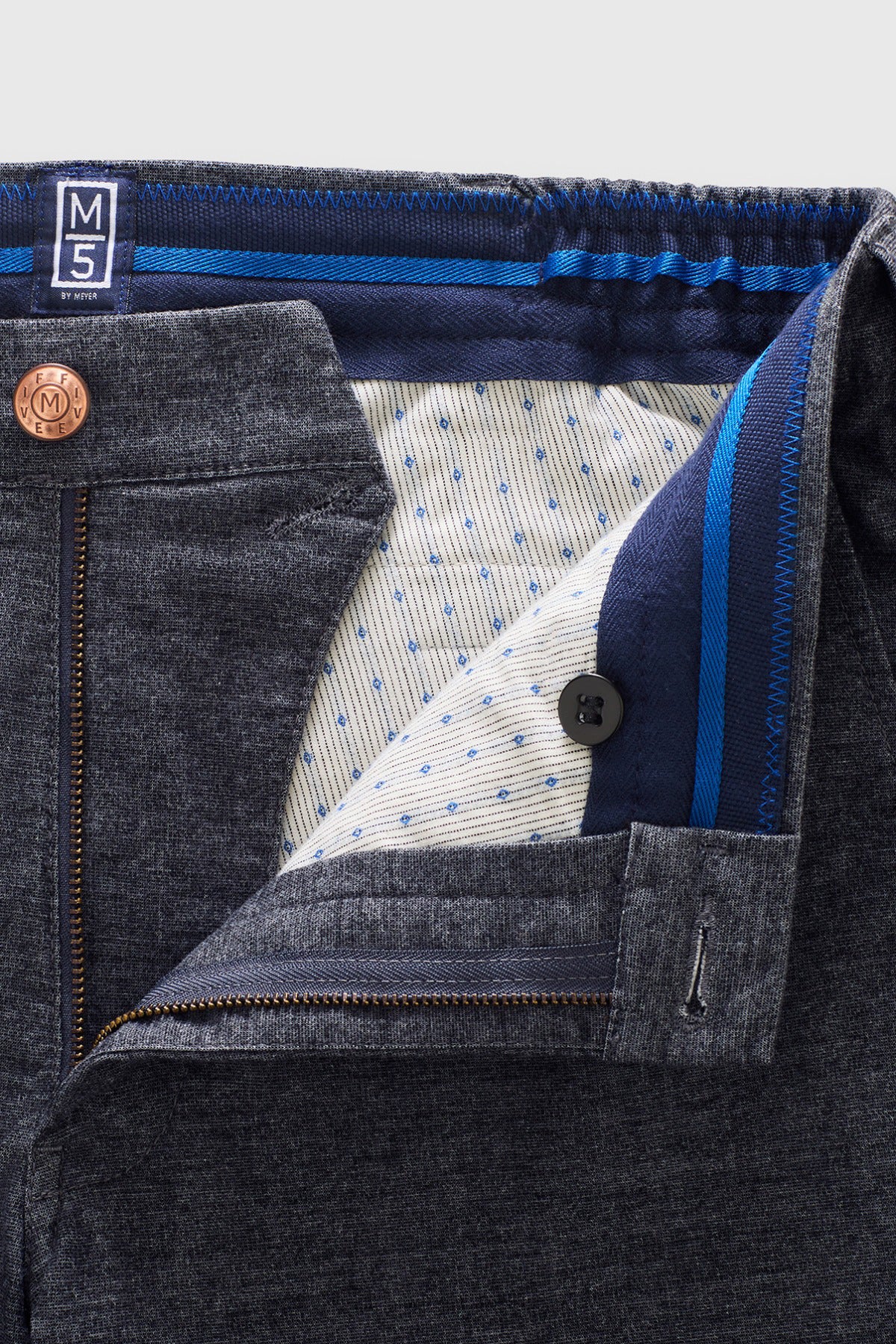 Marineblå flannel chinos med elastik, kontrastsyning og mønstret inderfor, kobberknap, stoflabel MS.