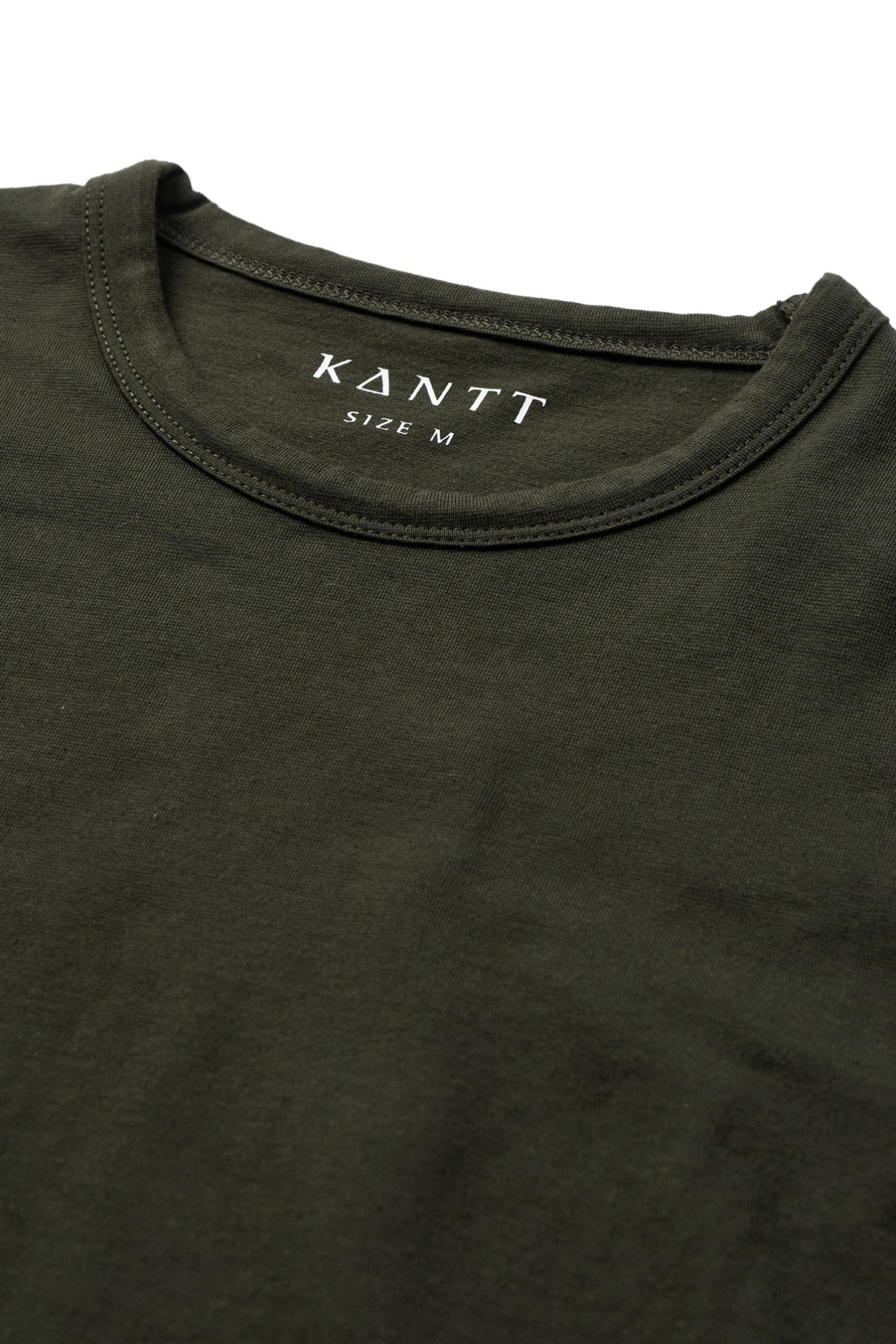 Langærmet bomulds-t-shirt i mørkegrøn, rund hals med Kantt-logo indvendig.
