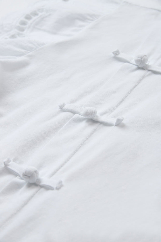 T-shirt med broderi anglaise og sløjfedetaljer
