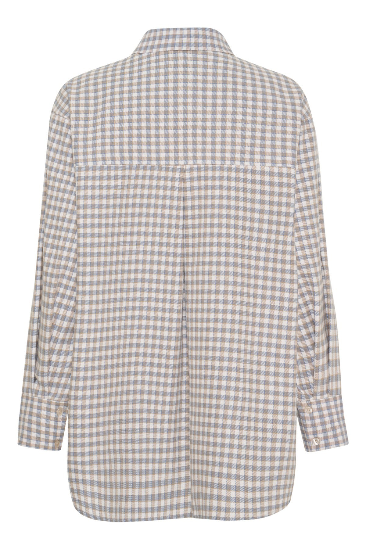 Blåternet skjorte i oversized fit med lange ærmer og krave, let rundet kant.