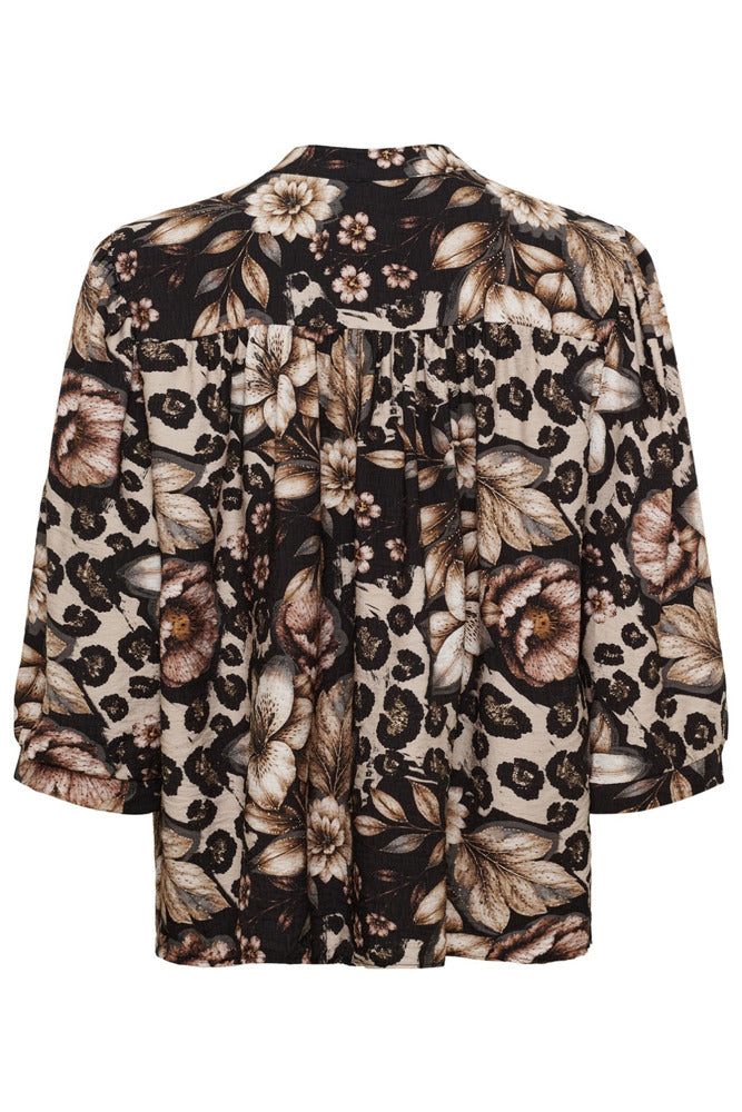 Sort skjortebluse med brune og beige blomsterprint og knapper foran.