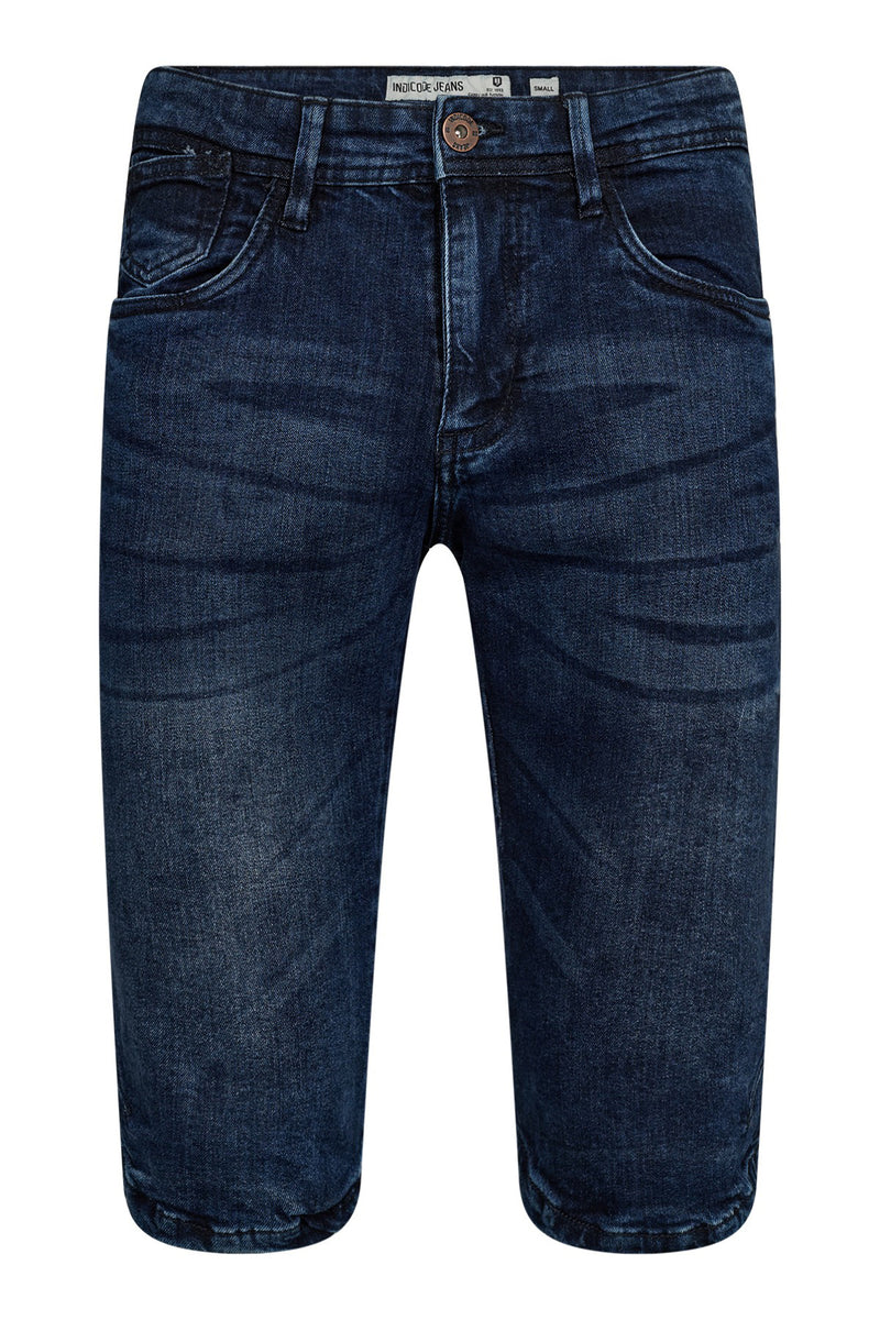 Mørkeblå denim knælange knickers med lommer og syninger.