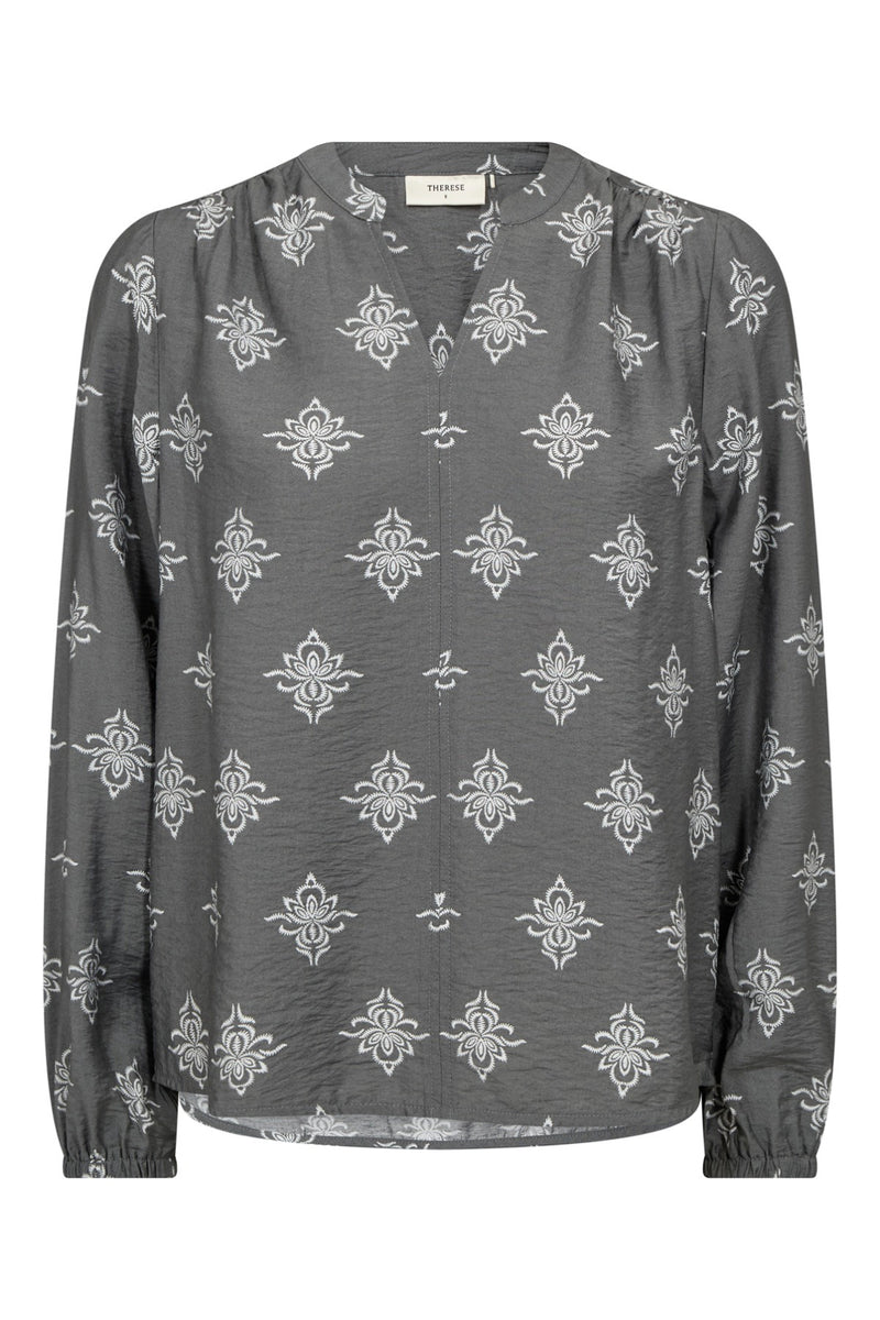 Grå viskosebluse med hvidt geometrisk print og lange ærmer.
