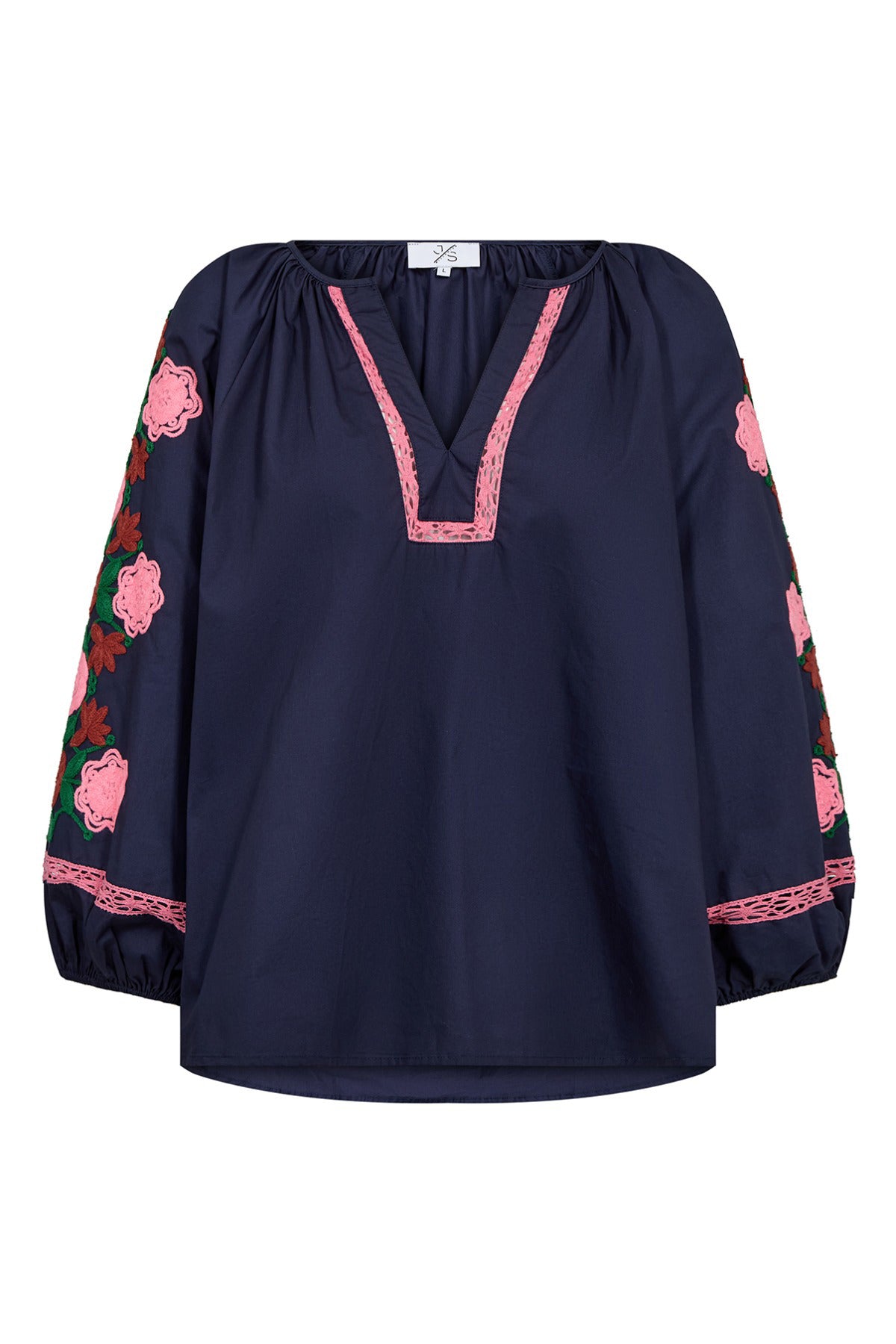 Bluse med blomsterbroderi på ærmet