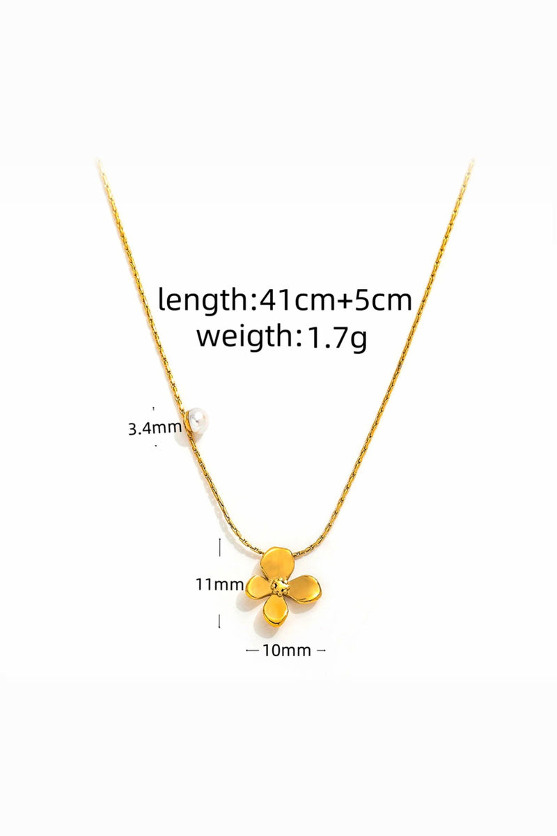 18k forgyldt halskæde med lille blomster vedhæng, delikat og skinnende design.