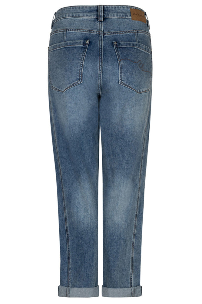 Vintage blå jeans med opsmøg, slidte detaljer og baglommer.